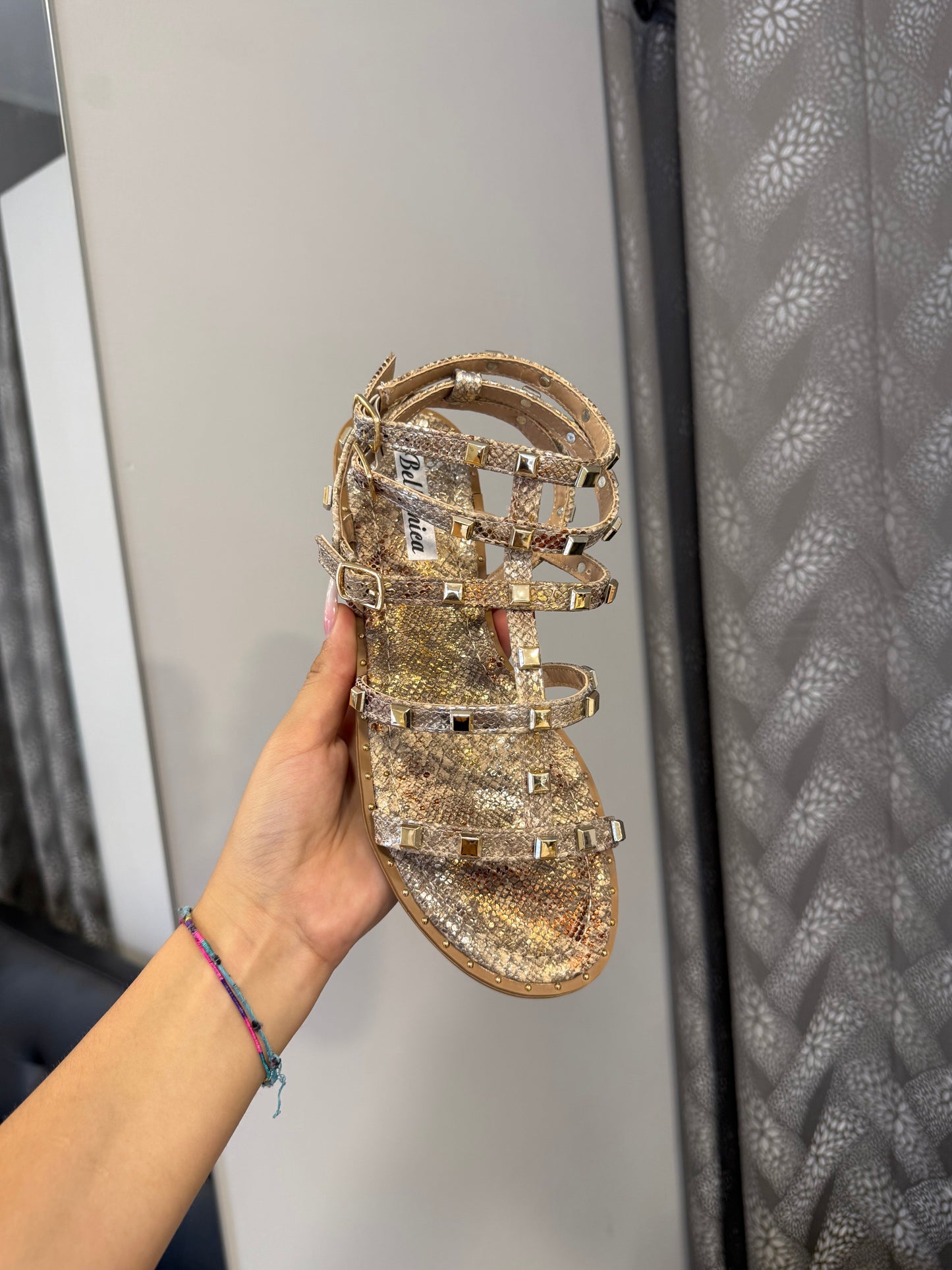 sandali PYTHON con borchie